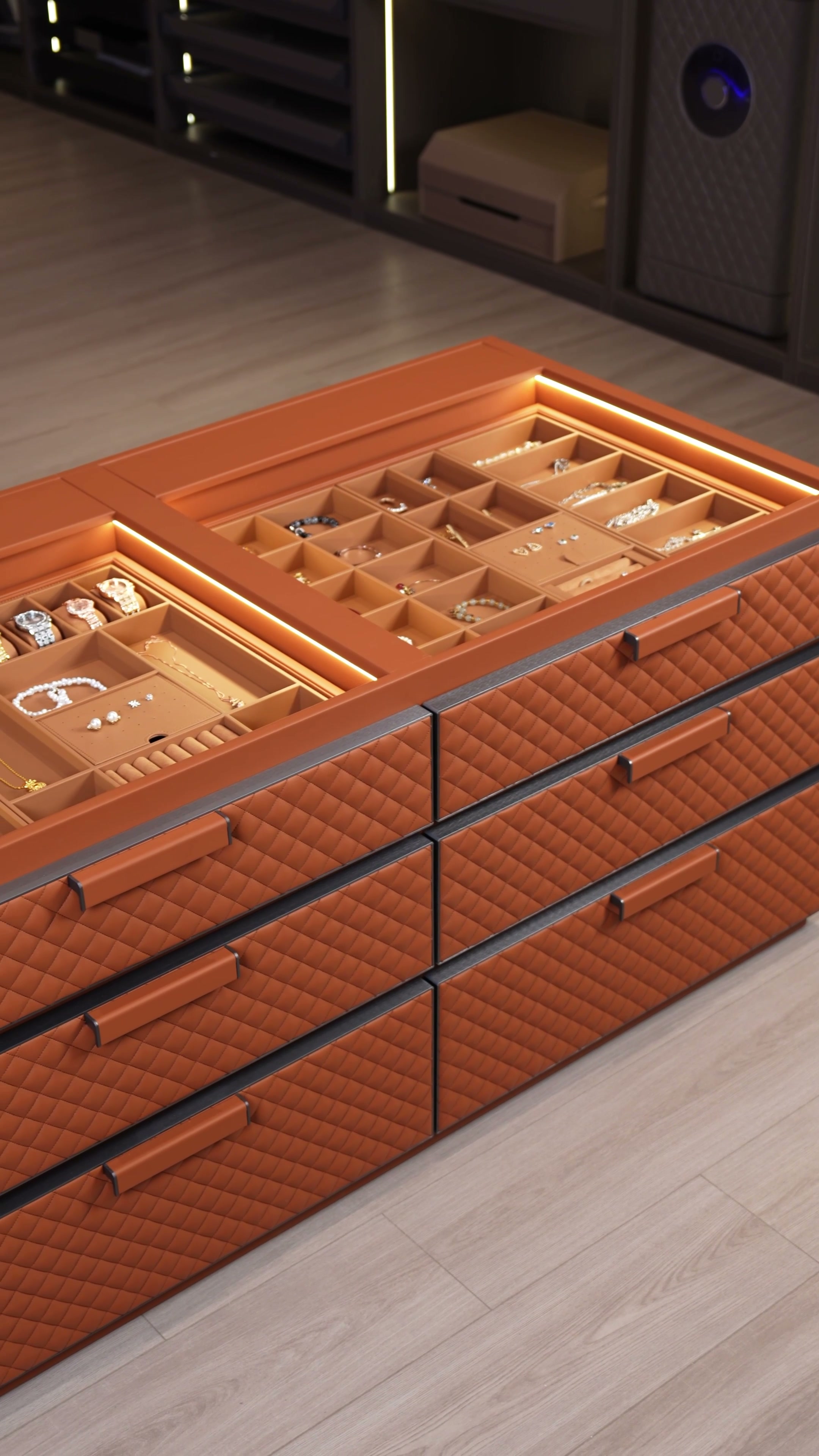 Orange leather dressing room island with softly lit jewellery compartments in the NewAllan showroom